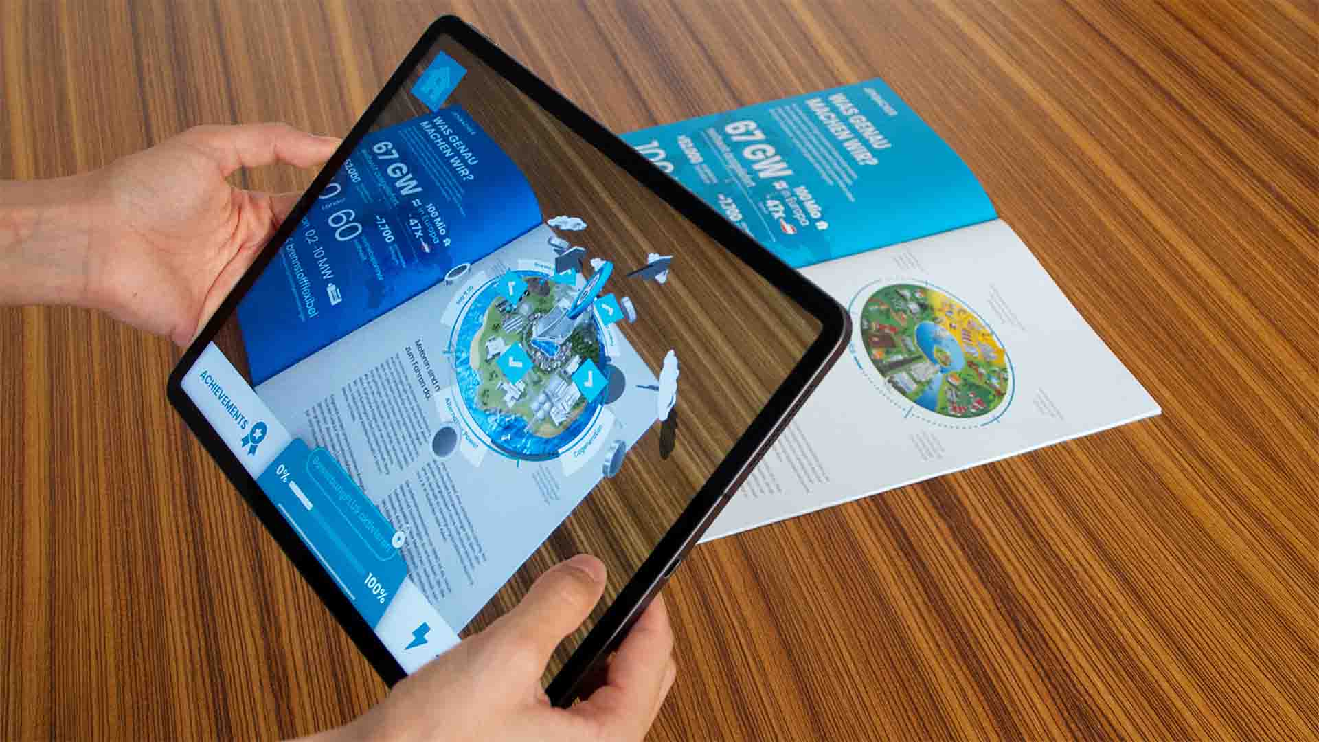 Die Augmented Reality App „Lehre bei Innio“ erweitert den gedruckten Lehrlingsfolder mit virtuellen Inhalten, die nach und nach freigeschaltet werden.